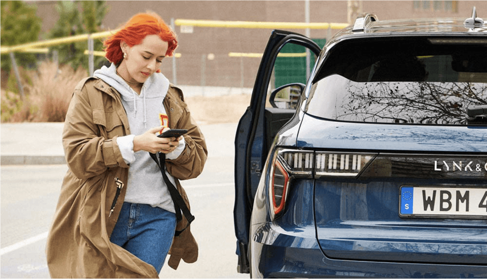 Woman using application for car specifications and purchases